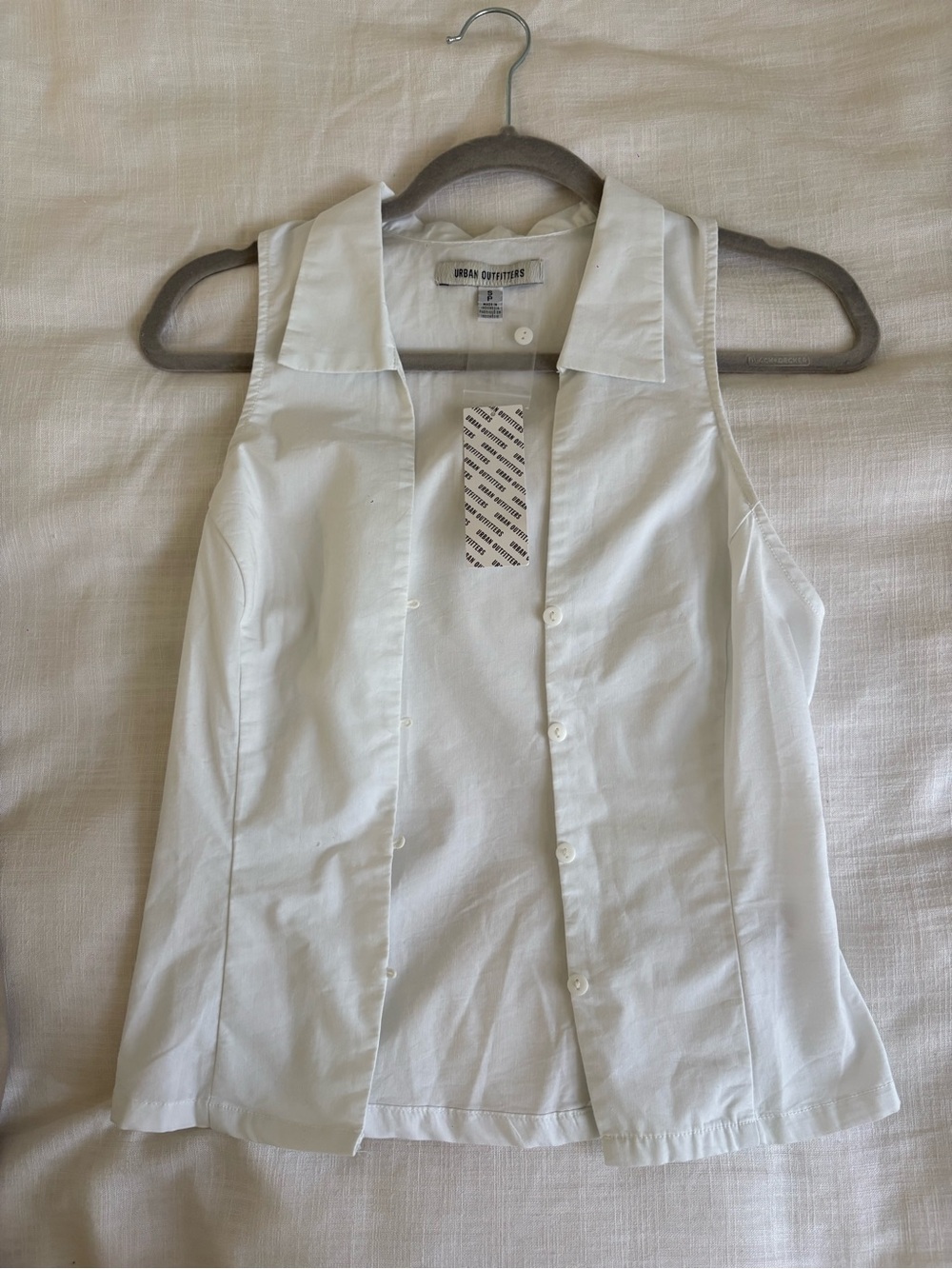Urban Outfitters White Sleeveless Button-Down Blouse